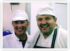 A Cheesemaker Showing Our Buyer How They Make Fresh Chèvre A Cheesemaker Showing Our Buyer How They Make Fresh Chevre
